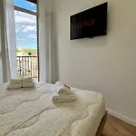 Апартаменты Pyramidhouse - 100mq With View - 2km From The Colosseum